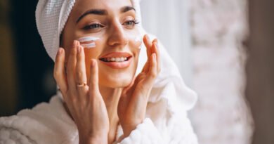 woman applying face cream